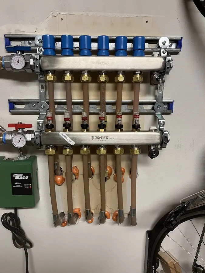 Plumber performing Water Heater Repair at a residential property in South Berwick